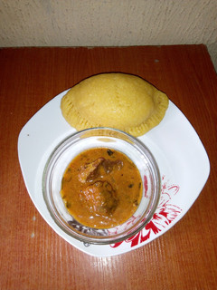 A picture of Meatpie Eba and Ogbono soup.