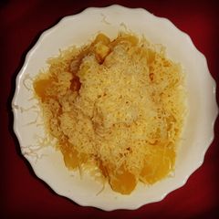 A picture of Cooked potatoes with Cheese.