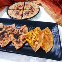 A picture of Paneer Pizza Stuffed Paratha.
