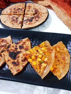 A picture of Paneer Pizza Stuffed Paratha.