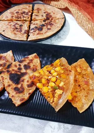A picture of Paneer Pizza Stuffed Paratha.