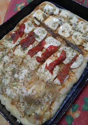 Una foto de La pizza casera que me piden que lleve a la reunión, al brindis