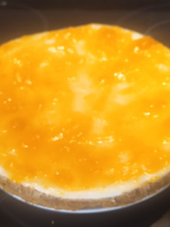 Foto principal de Tarta de cuajada y galleta con mermelada de melocotón