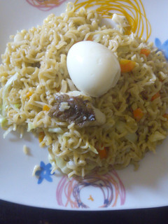 A picture of Noodles and boiled egg.