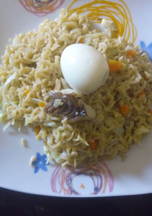 A picture of Noodles and boiled egg.