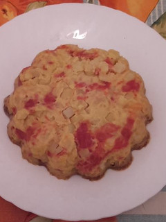 Una foto de Tortilla de patatas y pimientos asados