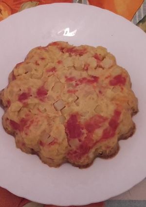 Una foto de Tortilla de patatas y pimientos asados