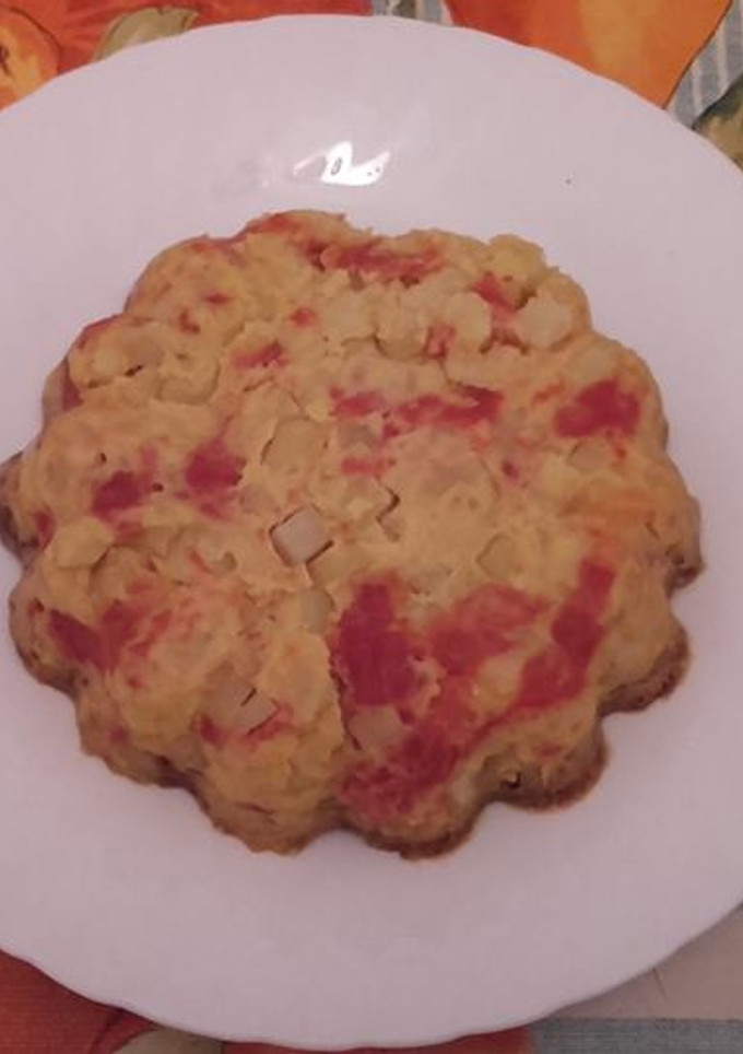 Una foto de Tortilla de patatas y pimientos asados