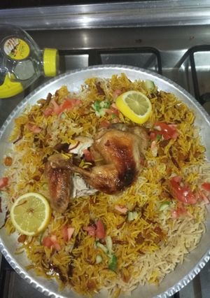 A picture of Rice and oven grilled chicken.