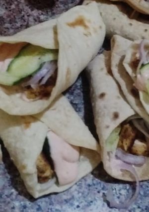 A picture of Chicken roll with tortilla.