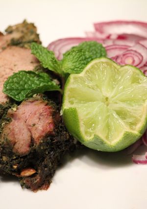 A picture of Roasted Leg of lamb with herbs and mushrooms.