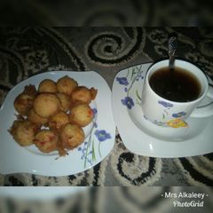 A picture of Yam balls with black tea.