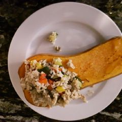 A picture of Butternut Squash with Ground Chicken, Vegetables and Rice.