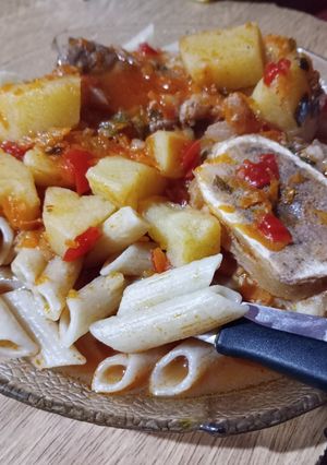 Una foto de Fideos con tuco y osobuco