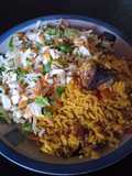 Palmoil rice and coleslaw