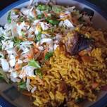 Jollof Rice and Chicken with Coleslaw - Travelandmunchies