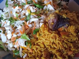 Palmoil rice and coleslaw