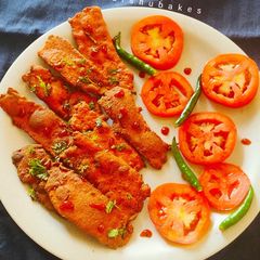 A picture of Chilli Tomato Fafda.