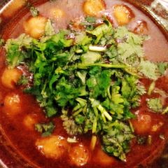 A picture of Spicy chole (Chickpeas).
