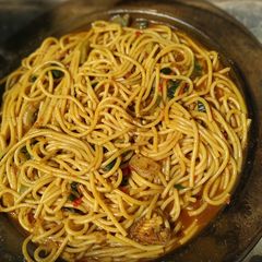 Local spaghetti jollof with Locust beans A picture of Local spaghetti jollof with Locust beans.
