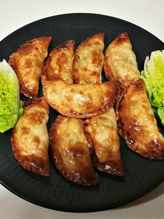 Una foto de Empanadillas de bacalao y pasas