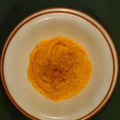 Una foto de Crema de calabaza con queso