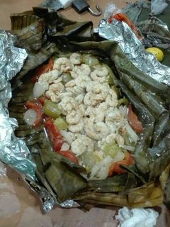 Una foto de Camarones a la ataud