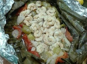 Una foto de Camarones a la ataud