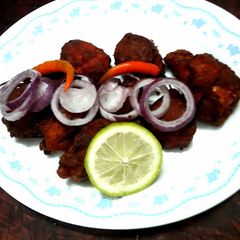 A picture of Besan chicken tonduri.
