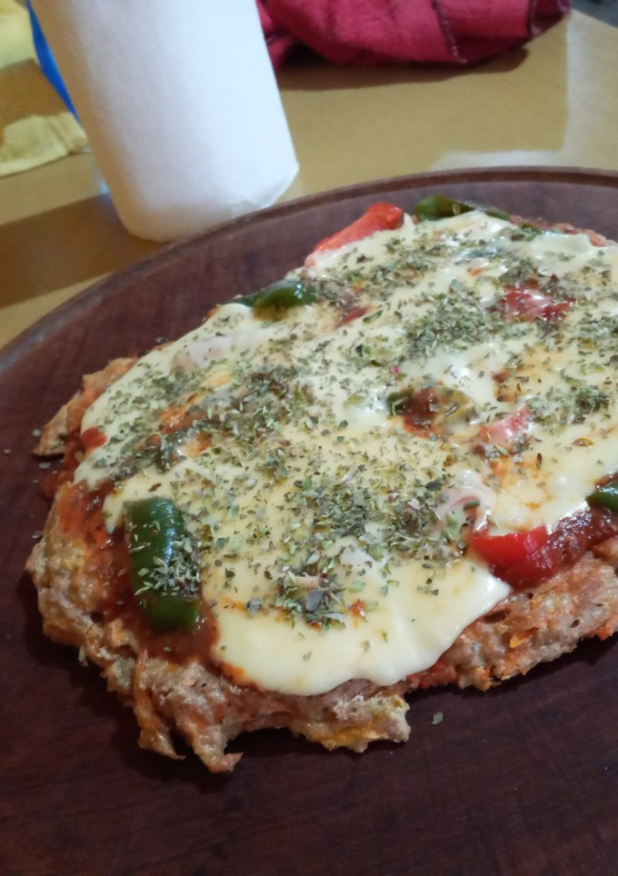 Una foto de Pizza a base de zanahoria y calabaza