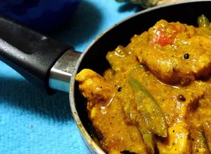 Una foto de Chicken Tika Massala con lo que haya