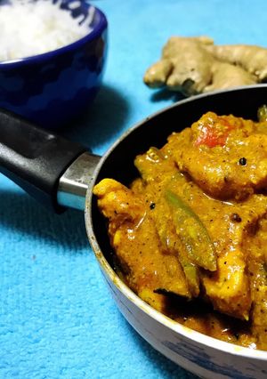 Una foto de Chicken Tika Massala con lo que haya