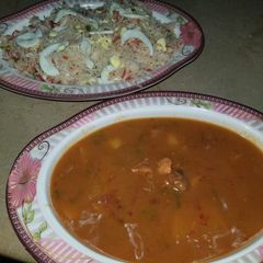 A picture of Shashlik with fried Rice.
