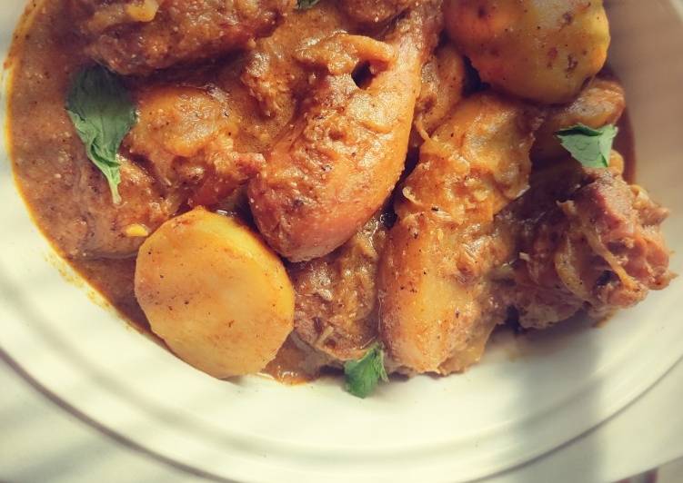 Steps to Make Quick Chicken Curry with raw papaya and potatoes