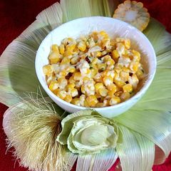 A picture of CHEESY AMERICAN CORN 🌽.