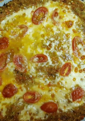 Una foto de Pizza de zanahoria y zucchini