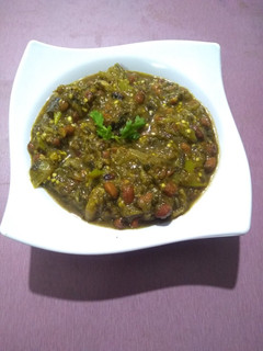 A picture of Green brinjal,gongura(sour leaves) curry.