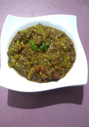 A picture of Green brinjal,gongura(sour leaves) curry.