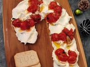Una foto de tomates cherry con queso