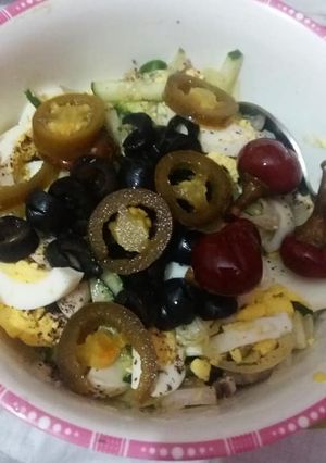 A picture of Egg and vegetable salad.