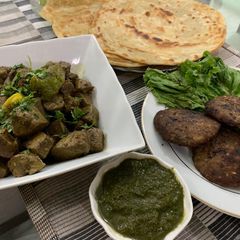 A picture of Mutton kaleji kache qeeme ke kabab paratha.