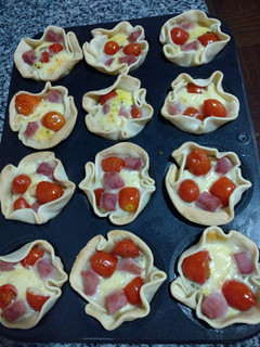 Una foto de Canastitas caprese