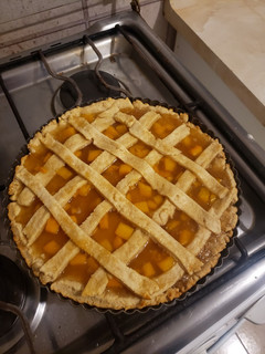 Una foto de Kuchen de durazno