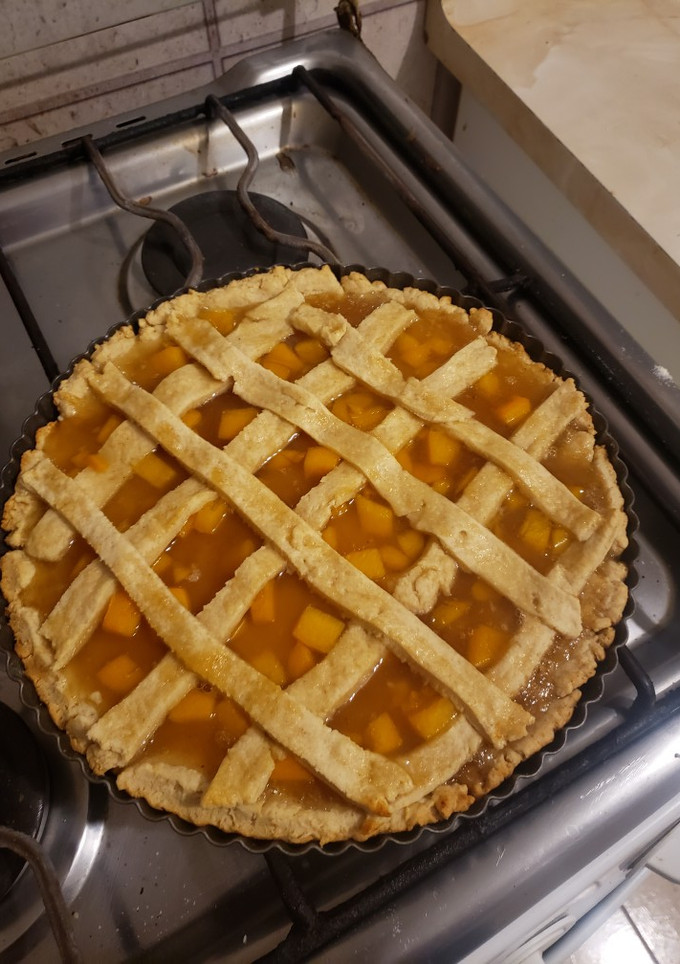 Una foto de Kuchen de durazno