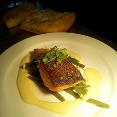 A picture of Salmon fillet with French beans and lemon hollandaise.