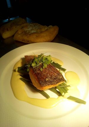 A picture of Salmon fillet with French beans and lemon hollandaise.