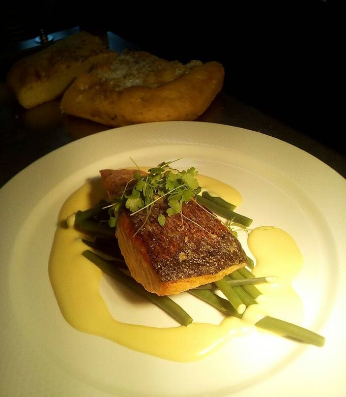 A picture of Salmon fillet with French beans and lemon hollandaise.