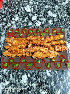 A picture of Chicken fingers.