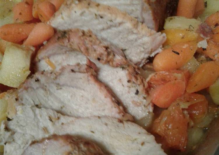 Pork loin with roasted apples and carrots