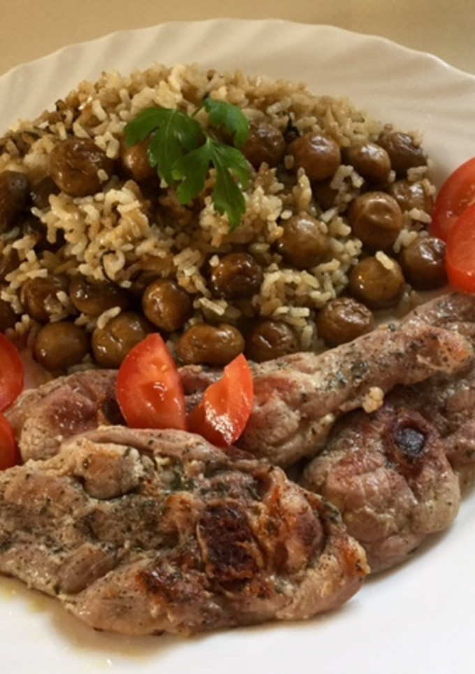 Una foto de Arroz con champiñones y pavo
